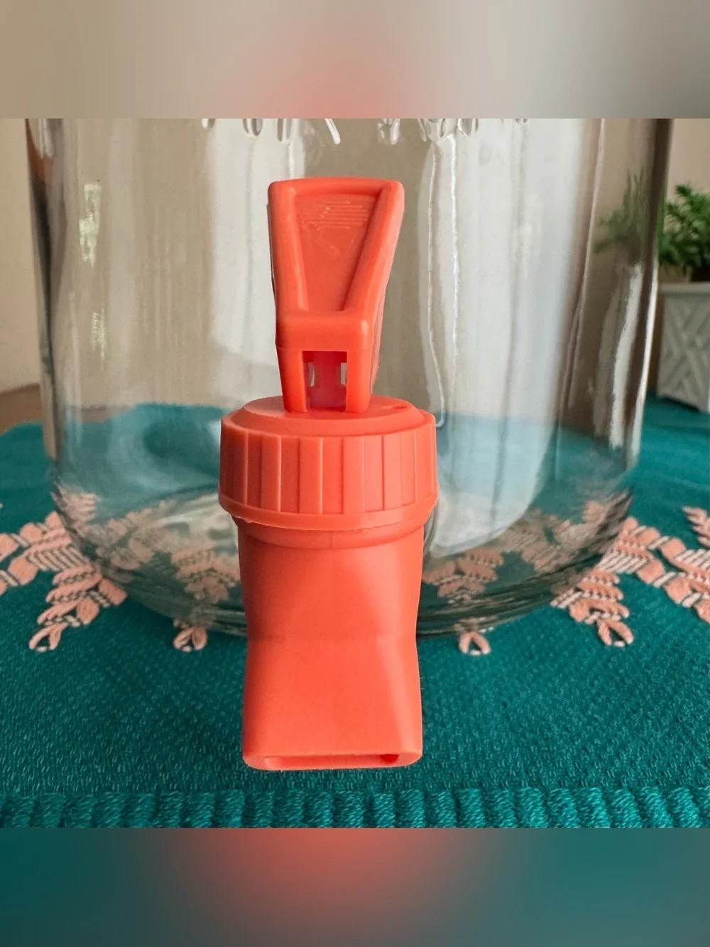 Quality Drinkware large beverage dispenser with salmon pink/peach lid